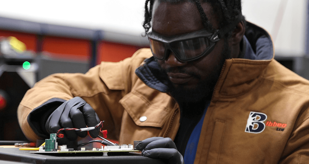 Bibbeo Employee working on a product assembly